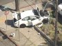 Child driving car hits, critically injures woman walking dog in Oakland; driver, child passenger also hurt